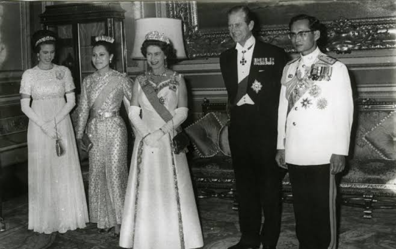 The Queen pictured on her trip to Thailand beside Thai leaders